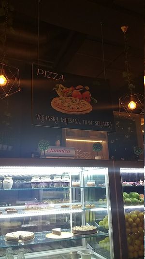Vegan pizza ad board at Green Caffe in Split