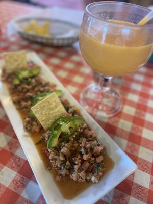 Vegan ceviche with “Bat Man” fruit juice  at Kahlo's Restaurant  in Denver
