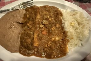 Cold beans, unflavored rice. The nopales enchiladas were ok.   at Kahlo's Restaurant  in Denver