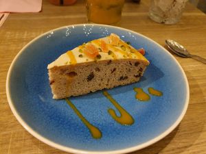 Banana walnut cake with passion fruit sauce, yummy! at Botanique in Hasselt