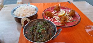Saag aloo, boiled rice and the Gobi pakora. at Lotus India in Lanzarote