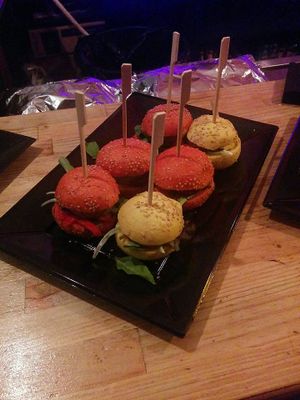 Vegan burgers with beans and caramelized onions with red bell peppers and tomato bread. at Fusiona Gastrobar in Merida