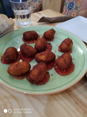 Croquetas de boletus y queso con mermelada casera de tomate at Fusiona Gastrobar in Merida