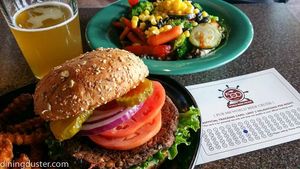 black bean burger with a side of peanut sauce and sweet potato fries at Pub 500 in Mankato