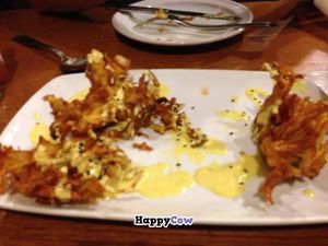 Crispy pakoras with a yogurt sauce. Fantastic starter. at Garraxi Restaurante Vegetariano in San Sebastian