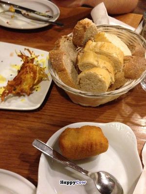 Vegetable cutlets, crispy pakoras and a bread basket at Garraxi Restaurante Vegetariano in San Sebastian
