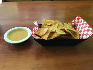 Tortilla chips and vegan queso. at Green Vegetarian Cuisine - Quarry Market in San Antonio