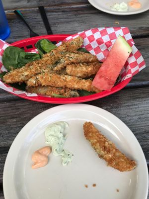 Basket of deep-friend kosher dill pickles. Amazing! at Green Vegetarian Cuisine - Quarry Market in San Antonio