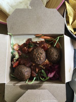 Small falafel box with the harissa sauce at Plantkind in Shrewsbury