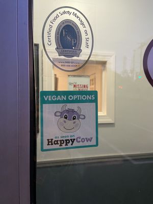 Nice to see Happy Cow on the door!  at Mandy's Pizza in Pittsburgh