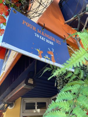 Outside line area for eating in  at La Banquise in Montreal