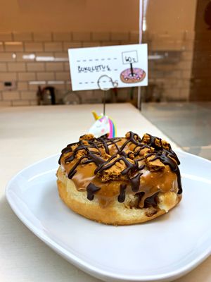 Chocolate donut with caramel cookie “Speculoos" #Veganuary at Blue Vegan Pig Shop in Prague
