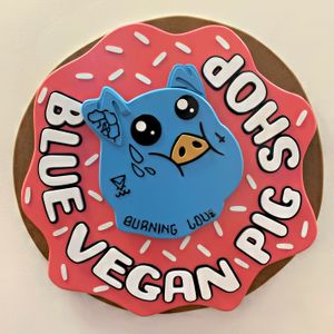 Company’s logo #Veganuary at Blue Vegan Pig Shop in Prague