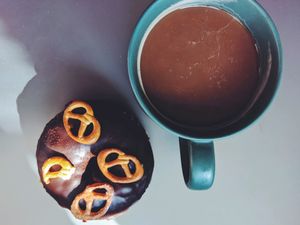 donut and coffee at Blue Vegan Pig Shop in Prague