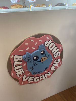 sign at Blue Vegan Pig Shop in Prague