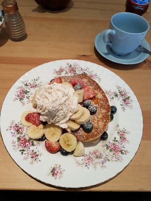 vegan pancakes with fruit and cream at The Orchard Cafe in Worthing