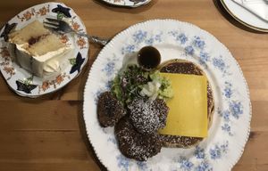 Pancakes with vegan cheese & Seitan, plus a side of Victoria sponge 🙏🏻 at The Orchard Cafe in Worthing