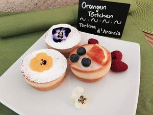 Hausgemachte Orangen-Törtchen at Pizzeria Bistro Mediterraneo in Merano