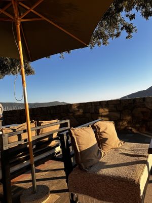 Next to seafront wall  at Cafe Barbarella in Herceg Novi