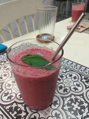 Pineapple, coconut milk, berries with a hint of mint. Deeelish! at Elephant in the Room in Thessaloniki