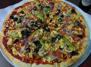 Vegan Kombination pizza (dayia cheese, mushrooms, bell pepper, vegan salami, vegan bacon) at Razzos Pizza And Salads in Hayward