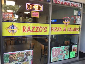 Storefront entrance at Razzos Pizza And Salads in Hayward
