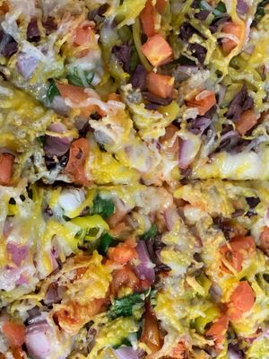 Greek style vegan pizza close up at Razzos Pizza And Salads in Hayward