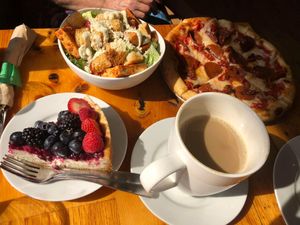 Vegan Caesar Salad, vegan pizza, vegan cheesecake and orzo latte. So delicious! Pic taken October 2023.  at Pulse Cafe in Hadley