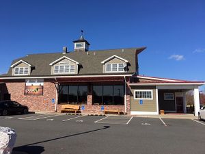 Restaurant from parking lot at Pulse Cafe in Hadley