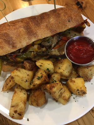 Philly cheesesteak (vegan, of course) with rosemary potatoes at Pulse Cafe in Hadley