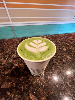 Maui matcha served with coconut milk and local honey. Honey is carefully collected by Jimmy Trujillo. Jimmy educates others, conserves and supports bees all over the island.  at Imua Coffee Roasters in Kapaa