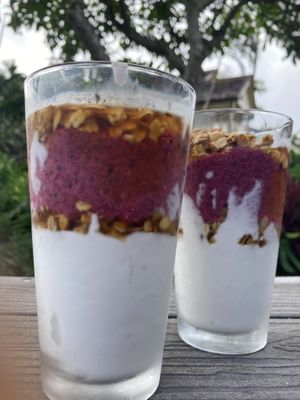 Dragonfruit, Lilikoi and mango chia parfait with granola and coconut yogurt. All ingredients are organic and vegan.  at Imua Coffee Roasters in Kapaa