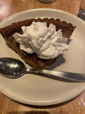 Squash pie with coconut whipped cream   at True Food Kitchen in Denver