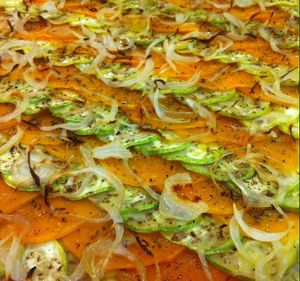 Pumpkin-Zuchini-Onion tart with some hummous at Mandala Kitchen in Lescala