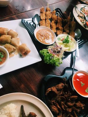 Spring rolls, satay (best), pork shreds at Talalask in Bangkok