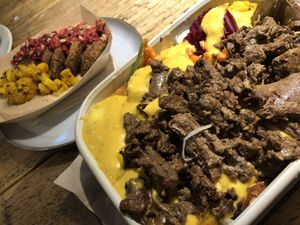 „beef“ teriyaki with many toppings and coconut-mango-curry sauce. Side dish falafel.   at Gustav Grün - Wolbecker Straße in Muenster