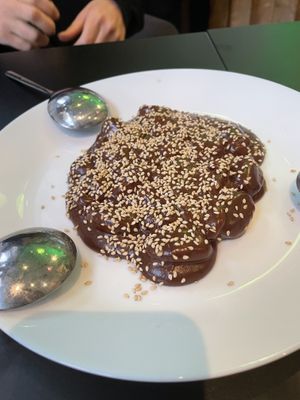 Potatoes covered with chocolate   at Vegan Yes in East London