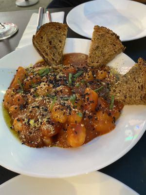 Gnocchi with an Asian twist—served with homemade bread  at Vegan Yes in East London