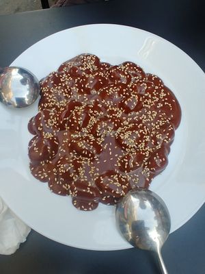 The "strange" dessert: gnocchi with chocolate sauce with a zing. Don't stay away for the look - it is really good (leave room for it, it's like a main dish!) at Vegan Yes in East London