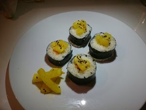 Kimchi Kimbap Yellow - rice wrapped in seaweed, fermented daikon, tumeric
 at Vegan Yes in East London