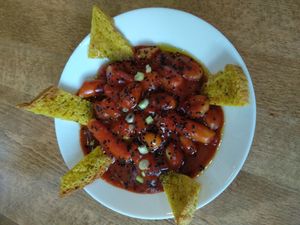 Toppognochhi with a Sriracha-like sauce. Super yummy and turmeric bread with Italian olive oil made it even better. at Vegan Yes in East London