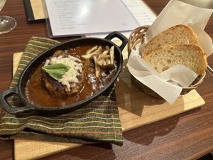 Soy Hamburg steak with brown sauce and vegan cheese   at Loca Kitchen in Tokyo