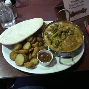 Vegan tikka masala with potatoes  at Cavens Arms in Dumfries