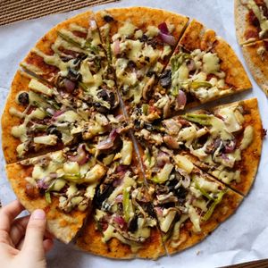 Supreme Indulgence
Our signature pizza
Topped with green bellpeppers, herbed onions, button mushrooms, smoky straw mushrooms, pineapples, and crumbles of our homemade Peppero-nice
Php450/box, Php65/slice at Indulge in Quezon City