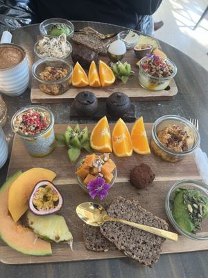 Closest tray is vegan, far plate is not  at Cafe Feel Good in Copenhagen