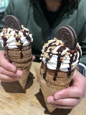 WE LOVE EVA'S CONES!! We normally get the peanut butter one and ask for an oreo instead of a reese's cup to make it vegan and obviously ask for the vegan option!! our fave!!   at Eva's Original Chimneys in Toronto