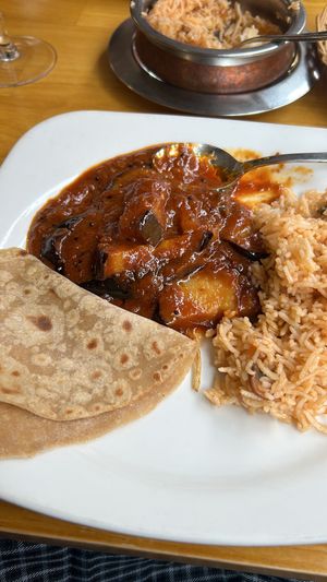 Aubergine curry and mushroom rice  at Koinonia in Newark