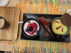 Dessert trio: panna cotta, brownie, fruit soup (from left to right) at Les Baux Jus in Les Baux-de-provence