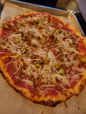 BYO small pizza with vegan cheese, vegan sausage, art hearts, and giardiniera at Need Pizza in Cedar Rapids