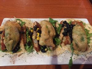 fried vegan chicken and fried avocado tacos  at The Whiskey Barrel in Hesperia